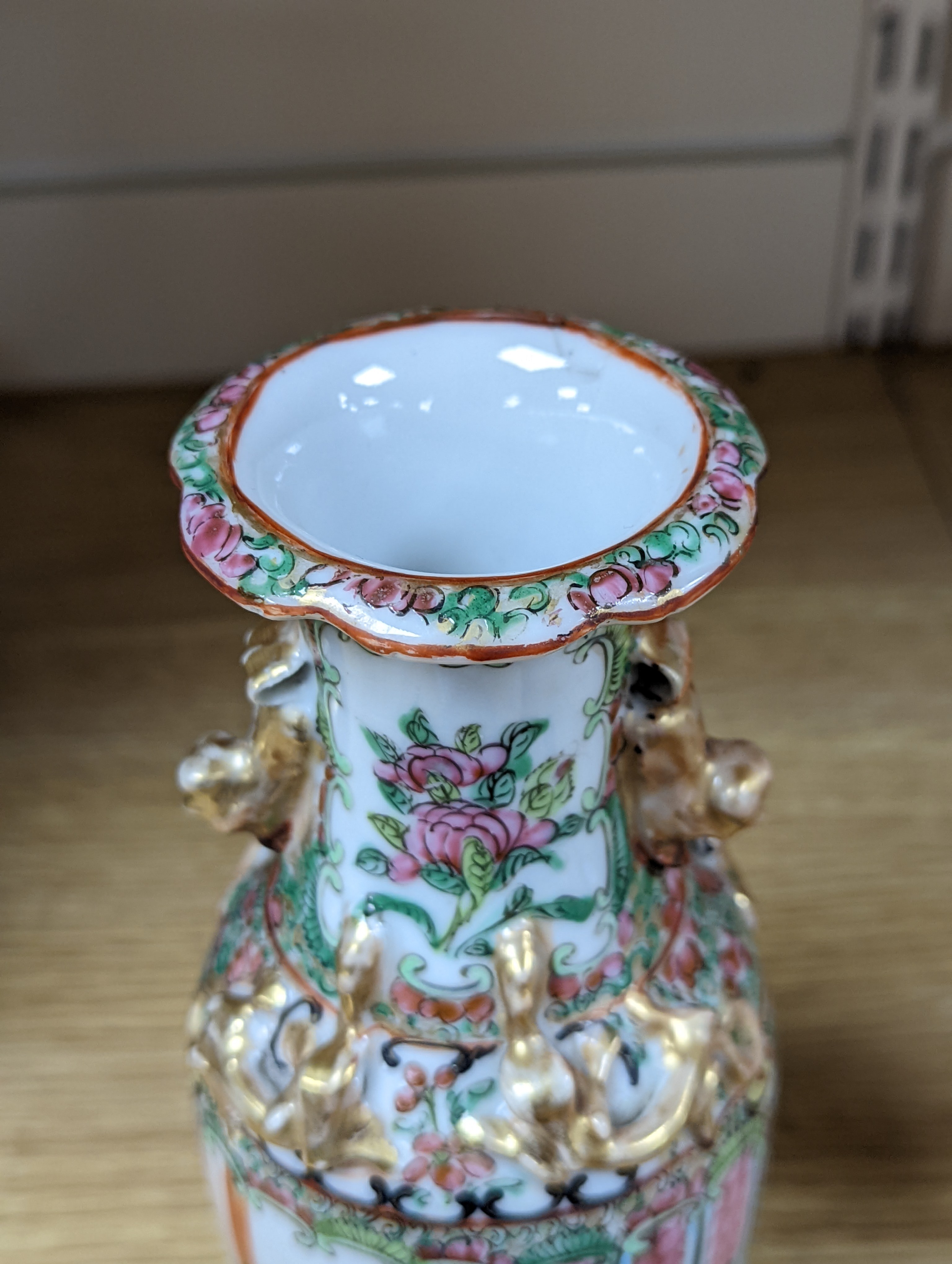 Four 19th century Chinese famille rose vases, 21cm